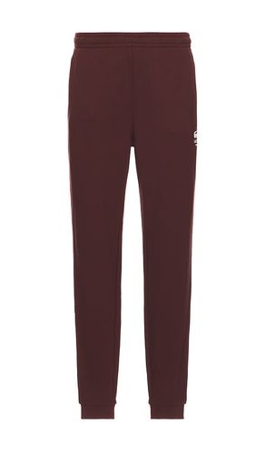 Pantalón deportivo tapered fit en color burgundy talla L en - Burgundy. Talla L (también en M, S) - Lacoste - Modalova