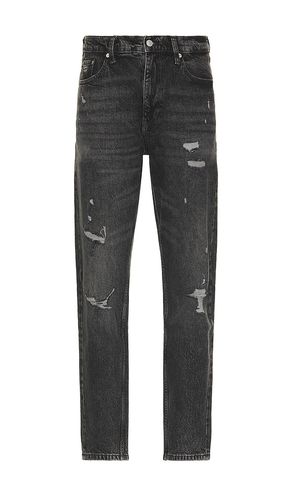 Isaac relaxed tapered jeans en color negro talla 30 en - Black. Talla 30 (también en 32, 36) - Tommy Jeans - Modalova