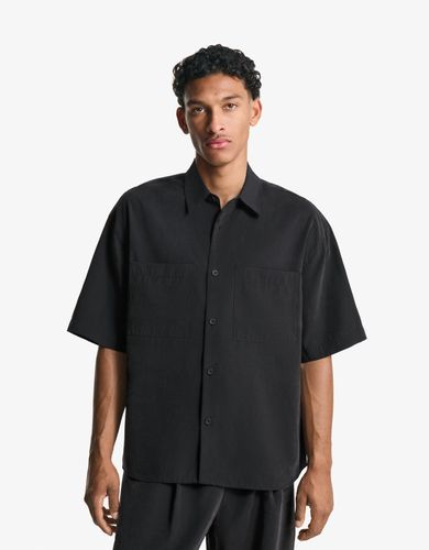 Orta Boxy Hombre Xs Negro" - Bershka - Modalova