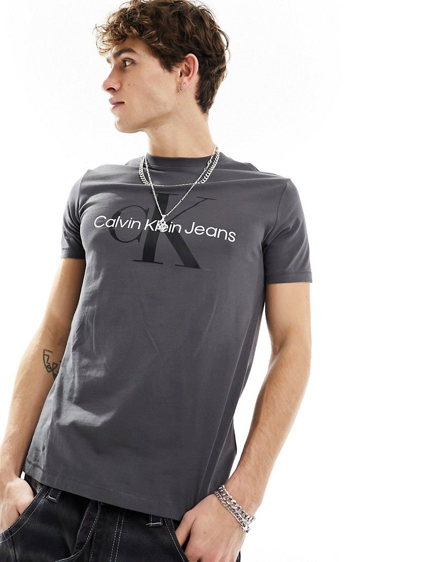 T-shirt scuro con logo a monogramma - Calvin Klein Jeans - Modalova