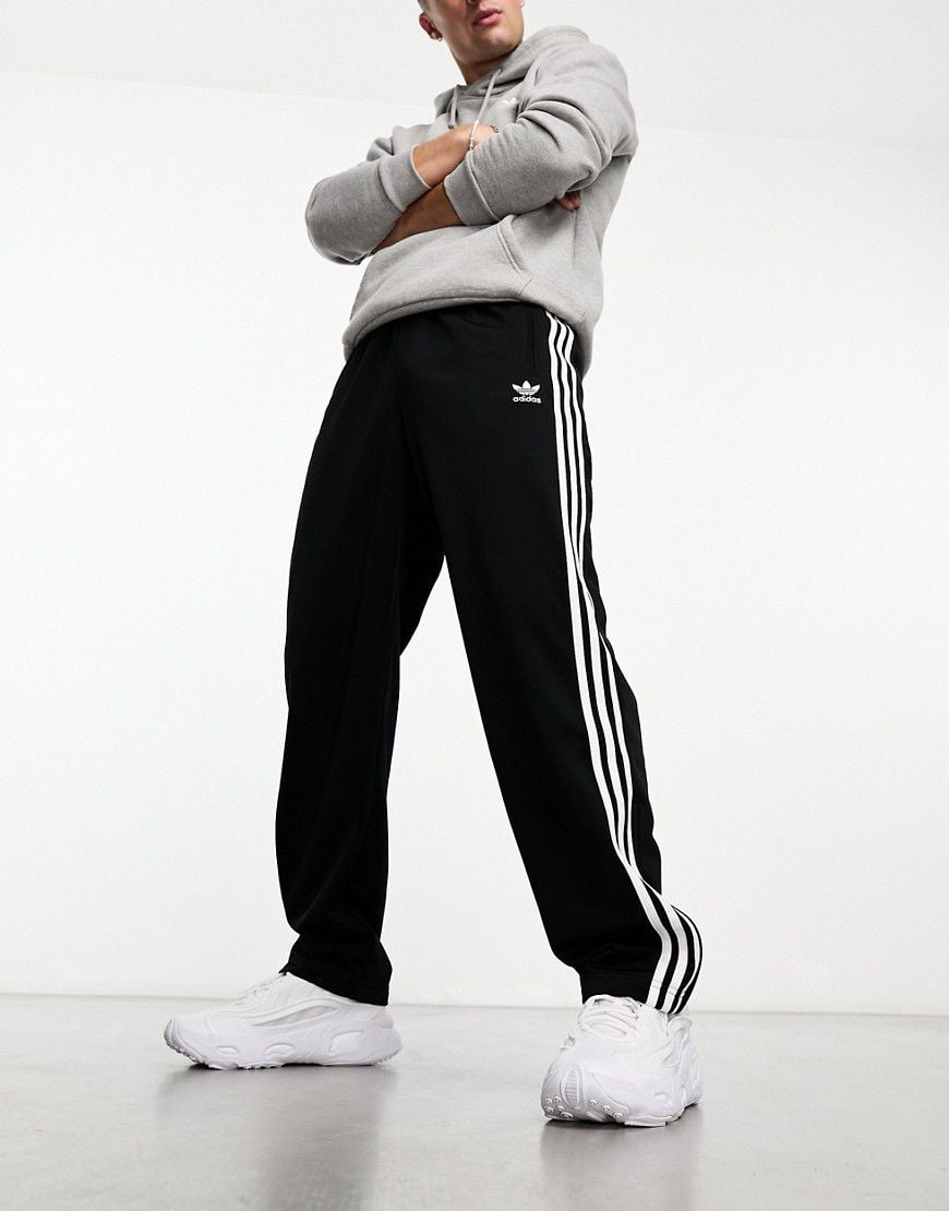 Firebird - Pantaloni sportivi neri - adidas Originals - Modalova