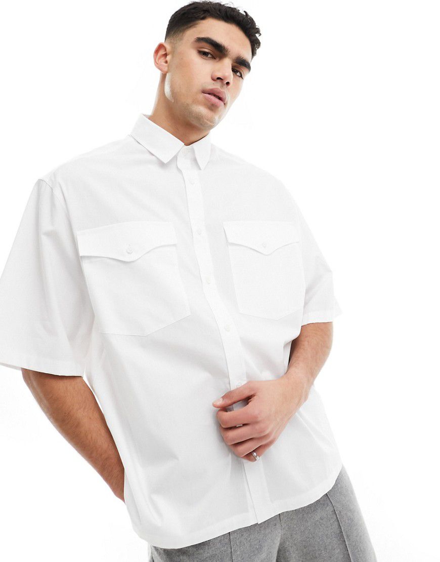 Camicia oversize squadrata a mezze maniche bianca con tasche grandi - ASOS DESIGN - Modalova