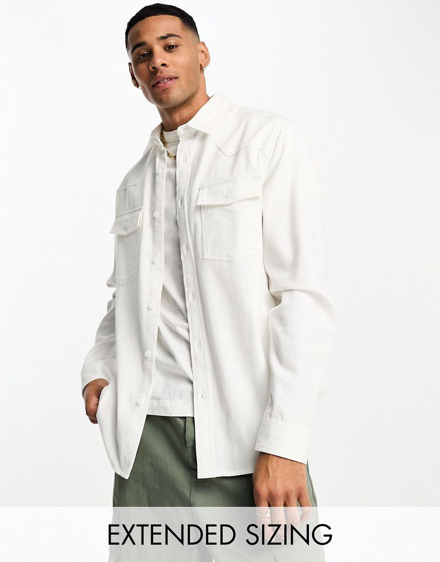 Giacca di jeans bianca con tasche stile western - ASOS DESIGN - Modalova