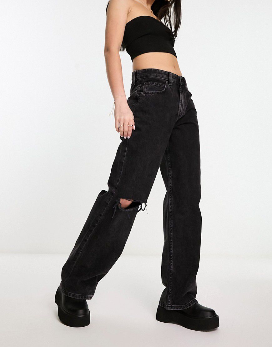 Jeans ampi stile boyfriend nero slavato con strappi sulle ginocchia - ASOS DESIGN - Modalova