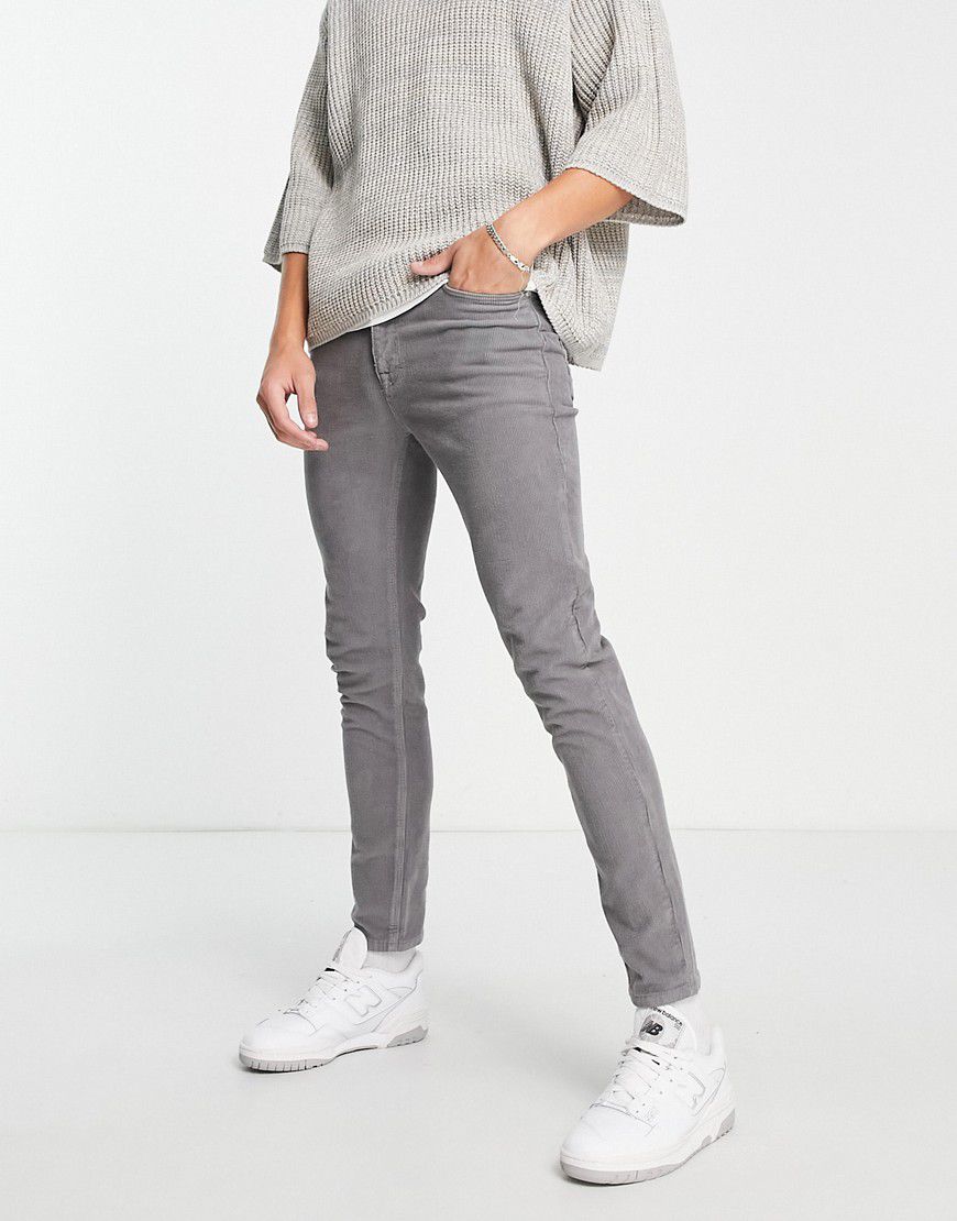 Jeans skinny scuro in velluto a coste elasticizzato - ASOS DESIGN - Modalova
