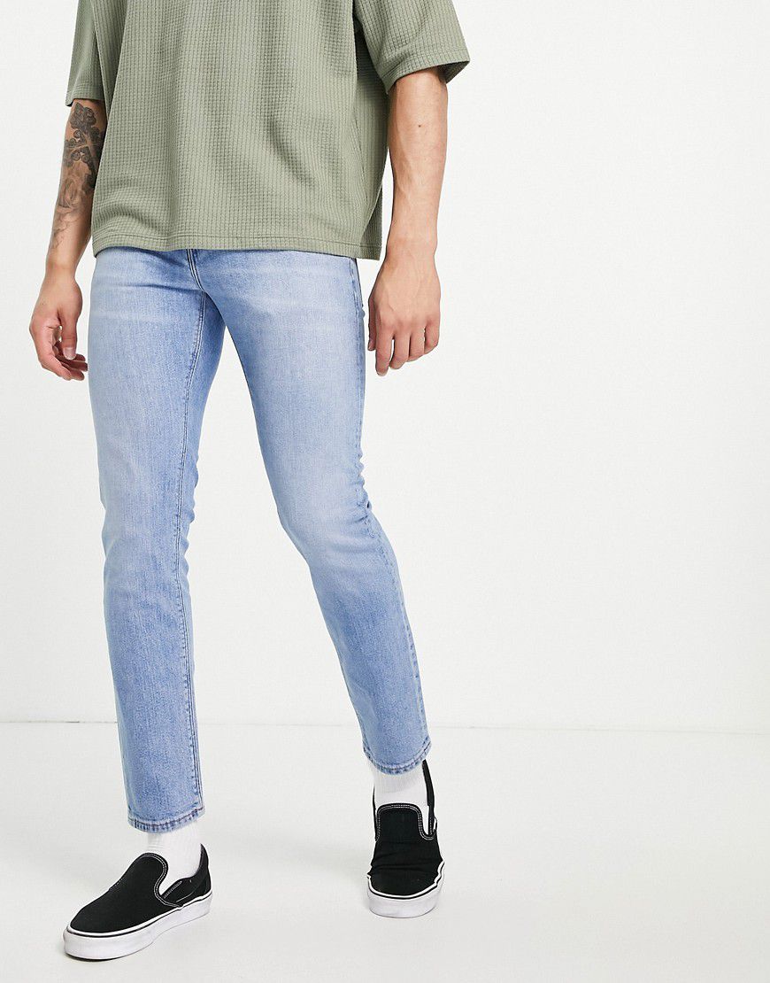 Jeans stretch e slim lavaggio chiaro vintage - ASOS DESIGN - Modalova