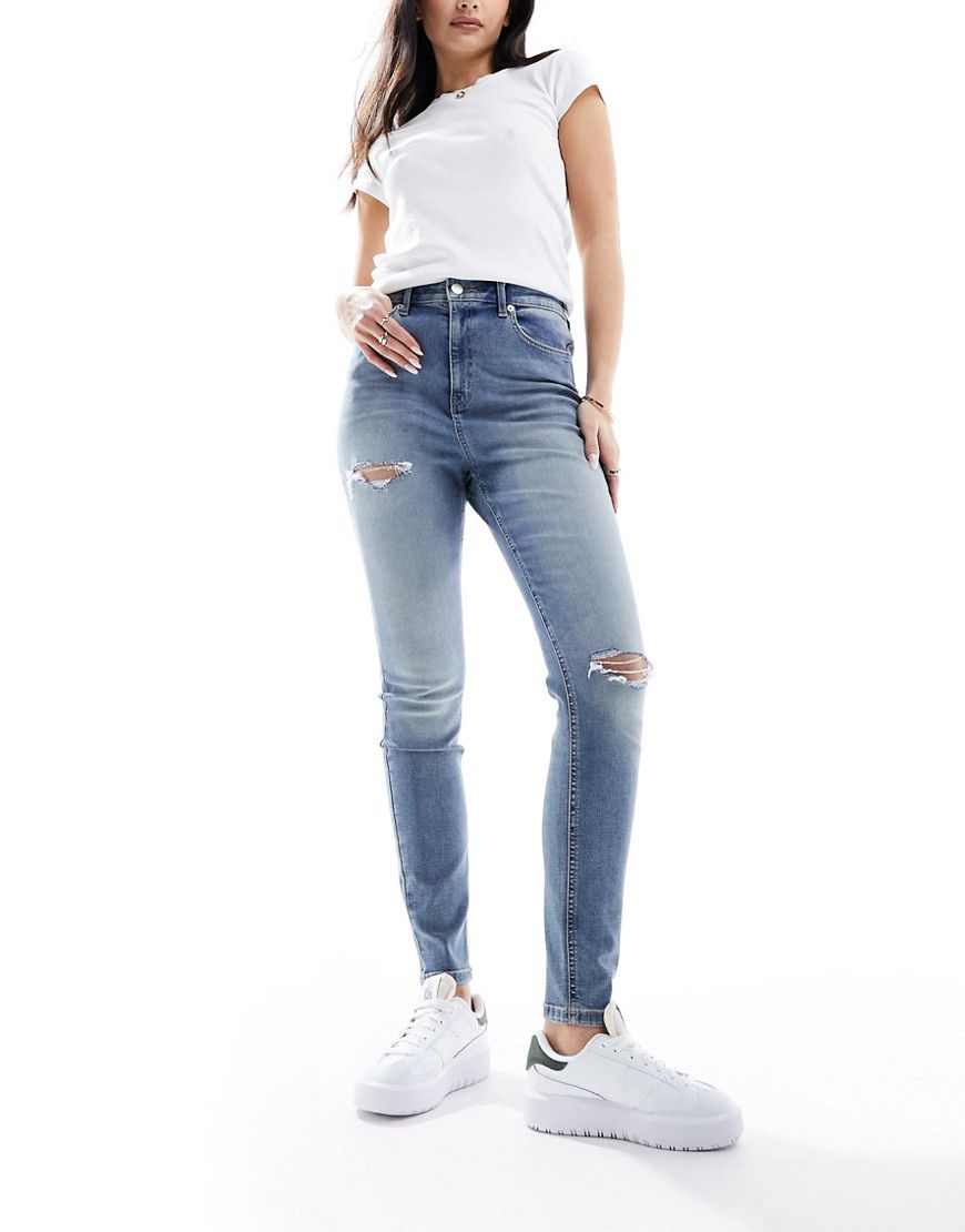 Ultimate - Jeans skinny chiaro con strappi - ASOS DESIGN - Modalova