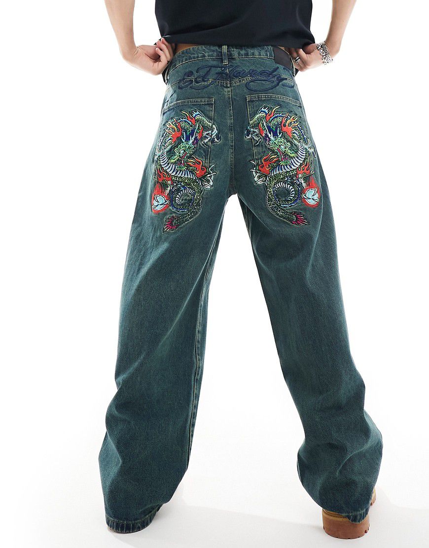 Jeans comodi in denim indaco sfumato verde con ricamo - Ed Hardy - Modalova
