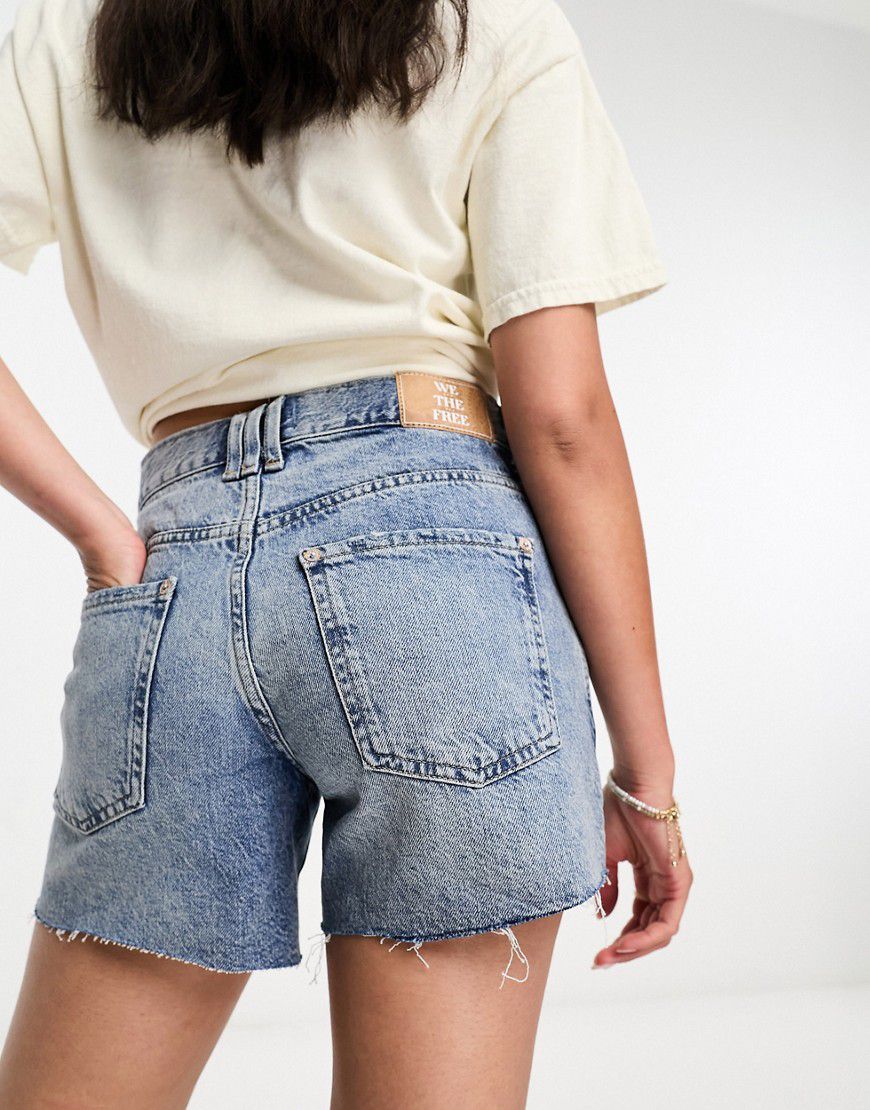 Pantaloncini di jeans classici medio con bordi grezzi - Free People - Modalova