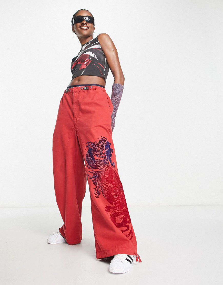 Pantaloni a vita bassa stile paracadutista rossi con motivo floccato - Jaded London - Modalova