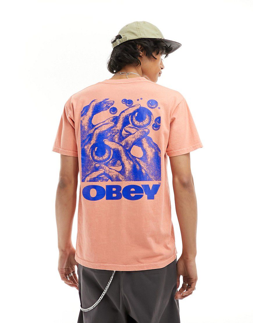 T-shirt color pesca con stampa grafica di occhio sul retro - Obey - Modalova