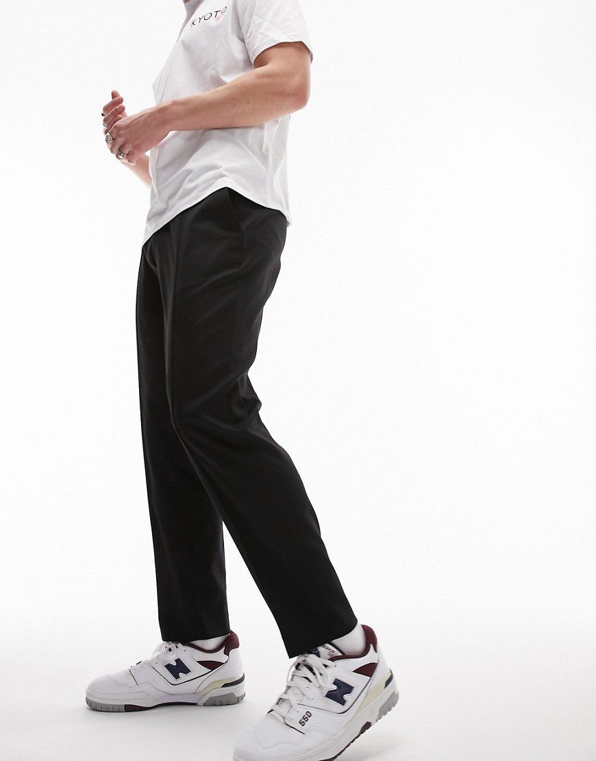 Pantaloni eleganti affusolati neri con fascia in vita elasticizzata - Topman - Modalova