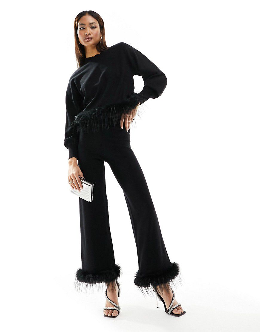 Pantaloni in maglia con fondo ampio neri con finiture in pelliccia sintetica in coordinato - Y.A.S - Modalova