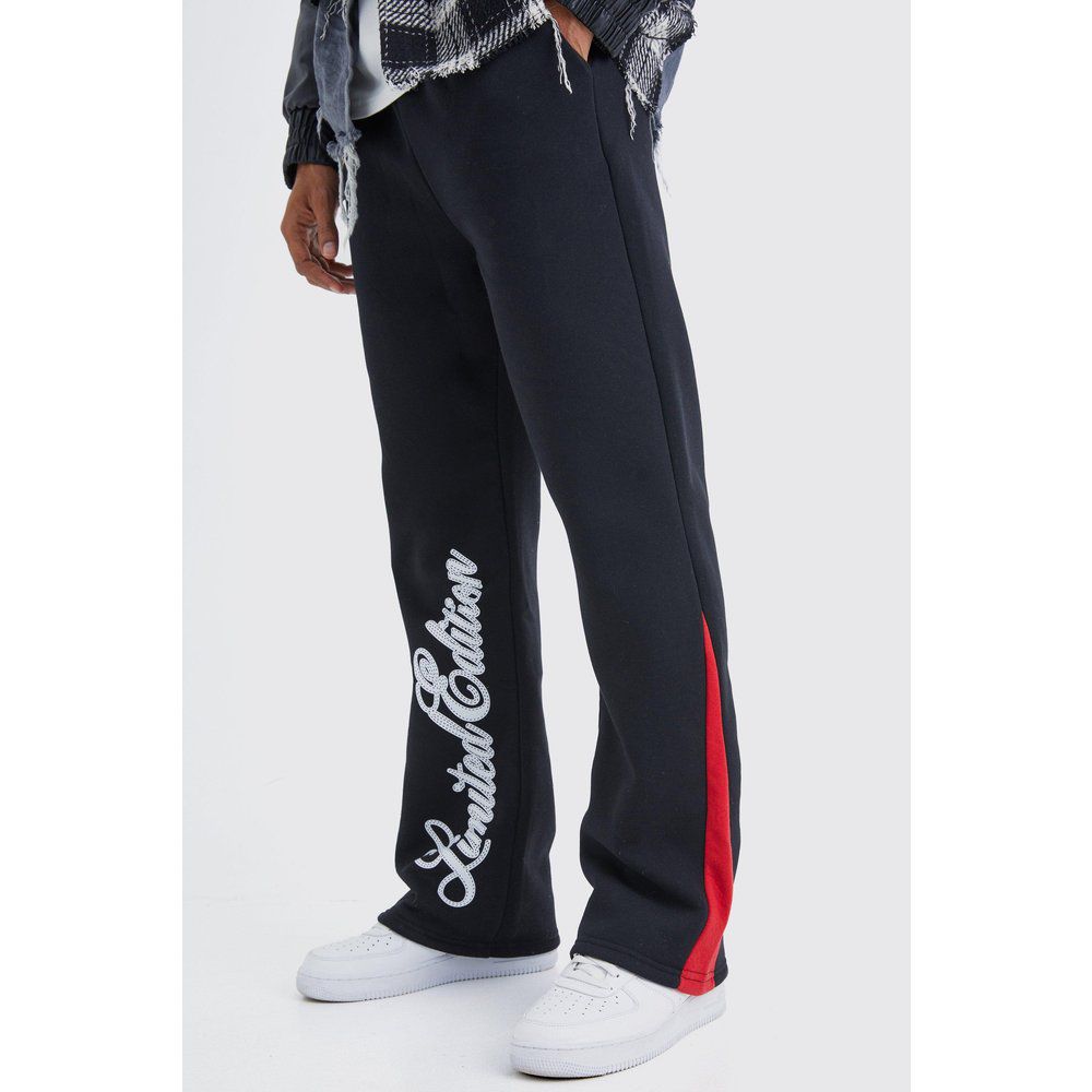 Pantaloni tuta Limited Edition con inserti e scritta - boohoo - Modalova