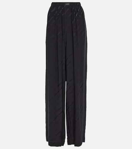 Pantaloni in seta a vita alta con logo - Balenciaga - Modalova